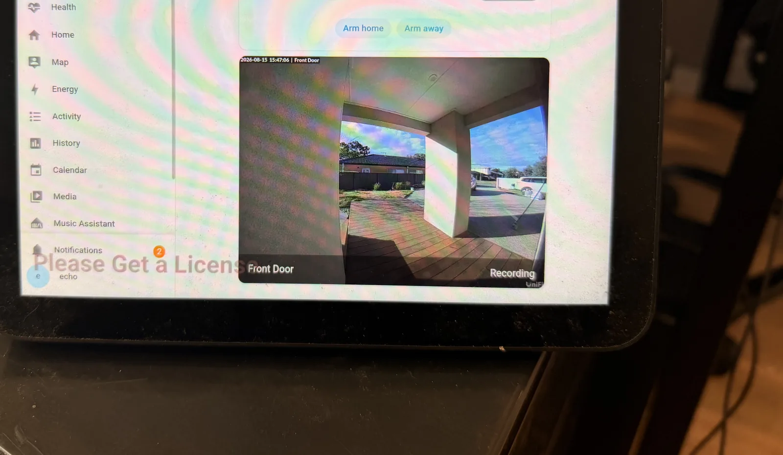 Our first attempt in Fully Kiosk Browser, with the standard Home Assistant sidebar and trial licence watermark still visible.