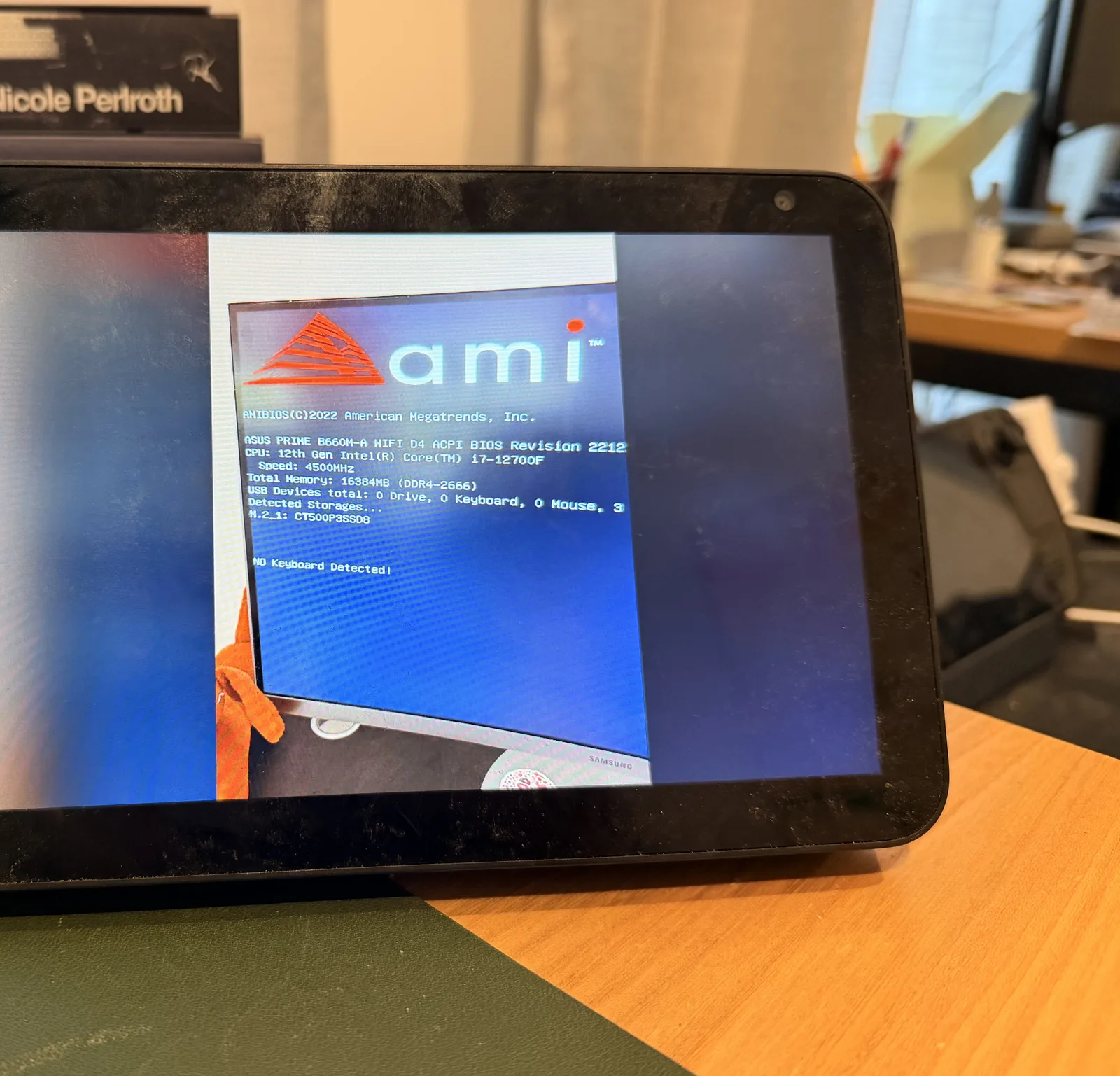 The Echo Show 8 running Kiosk Satellite’s Immich screensaver and displaying a portrait photograph.